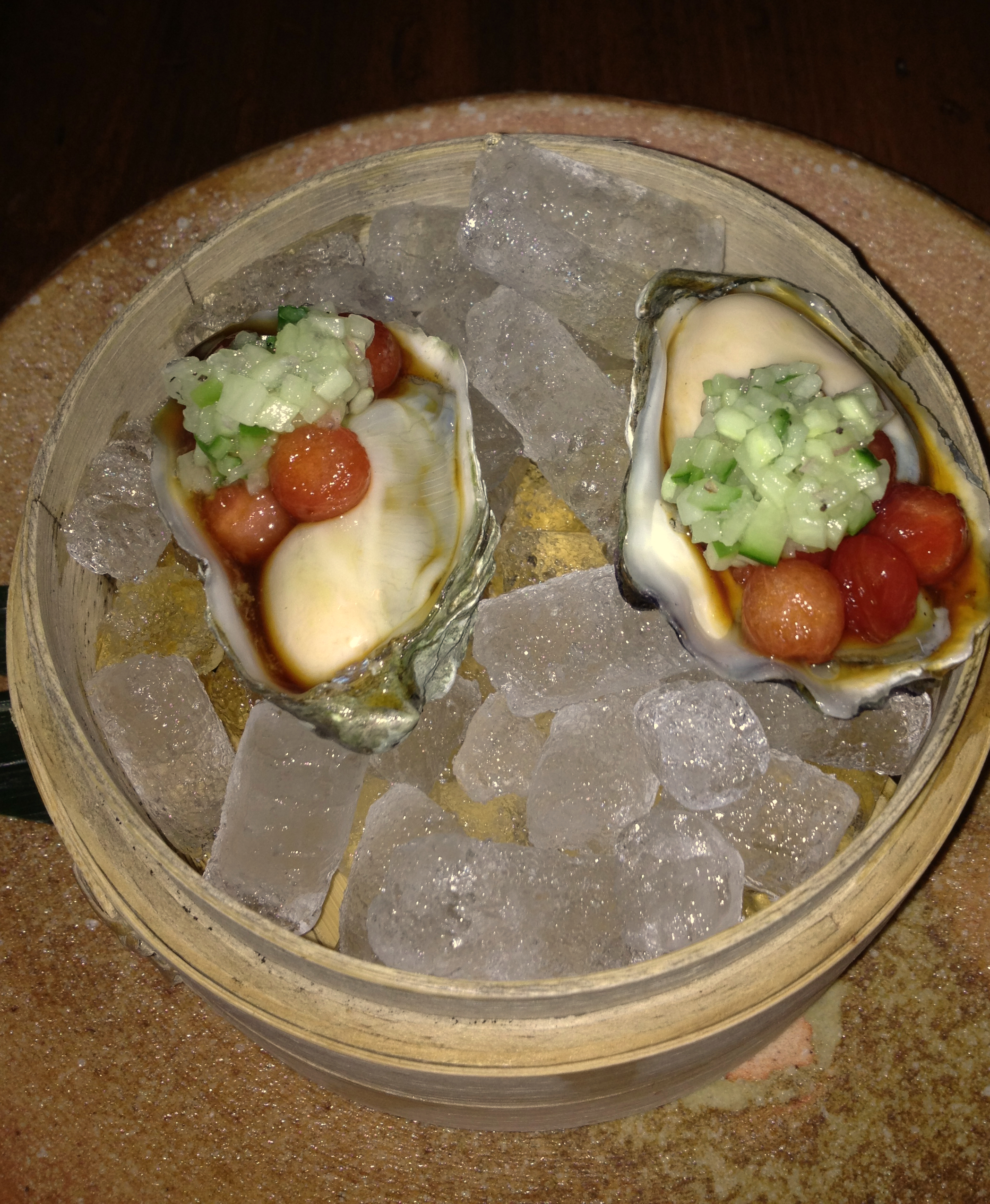 Kumamoto Oyster with watermelon pearls, cucumber mignonette