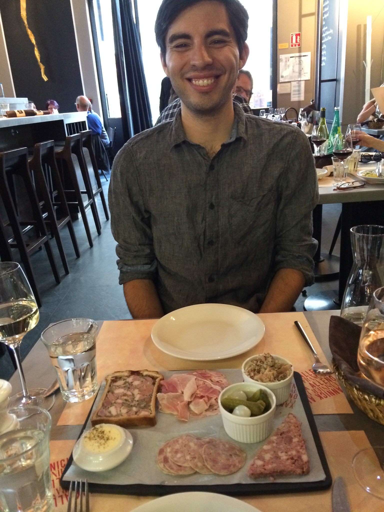 Enjoying charcuterie and cornichons at Terroir Parisien. The French like to start dinner with a plate full of meat. I say, pourquoi-pas?